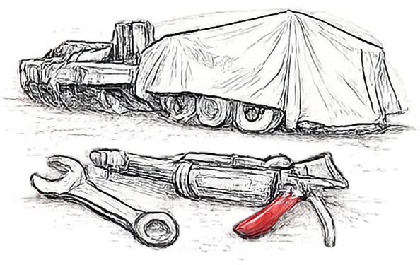 Wrench, grease gun, and shield inspection on an implement prepared for covered storage.