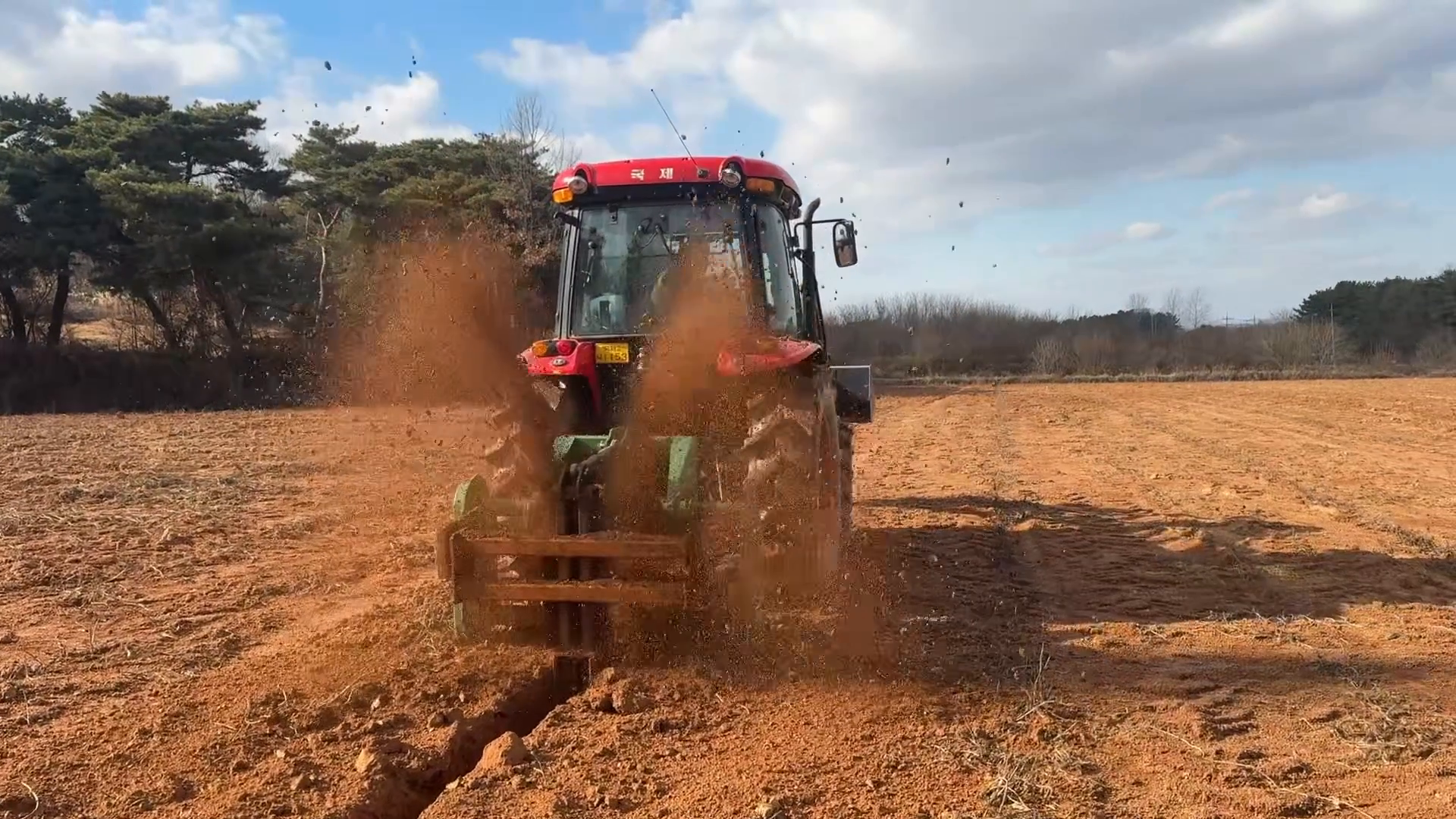 WeCan WRD rotary ditcher cutting a drainage channel